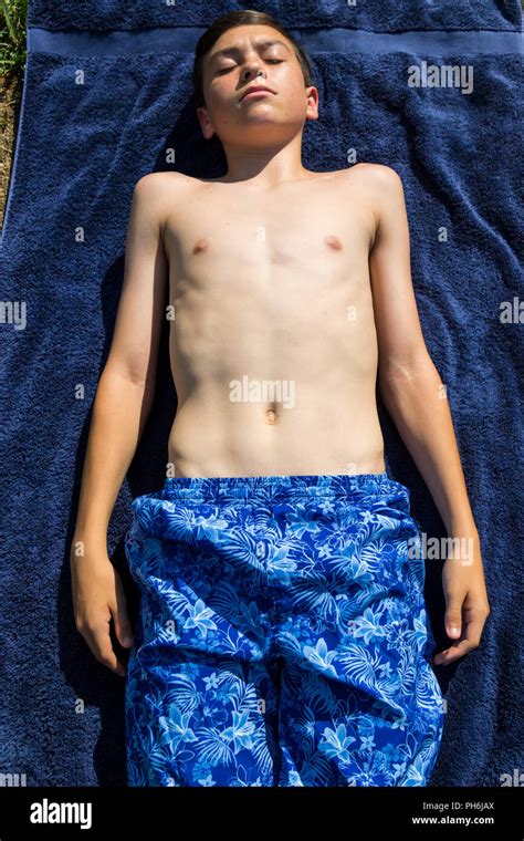 Teen Sunbathing Stock Photos, Images & Pictures